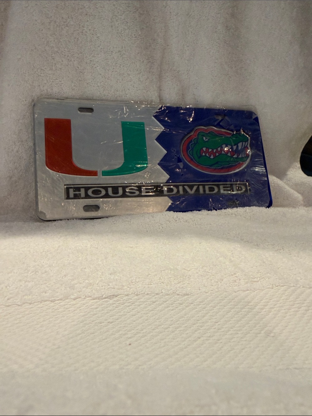 NCAA House Divided License Plate - White/Green/Orange/Blue